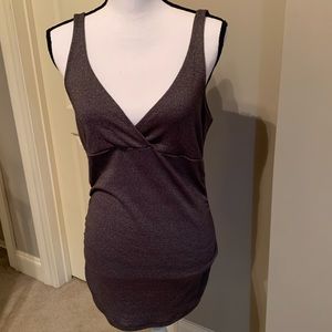 Cross over tank with side rushing